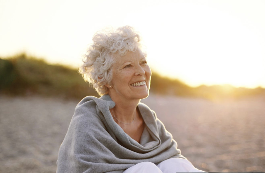 older woman grey hair glasses